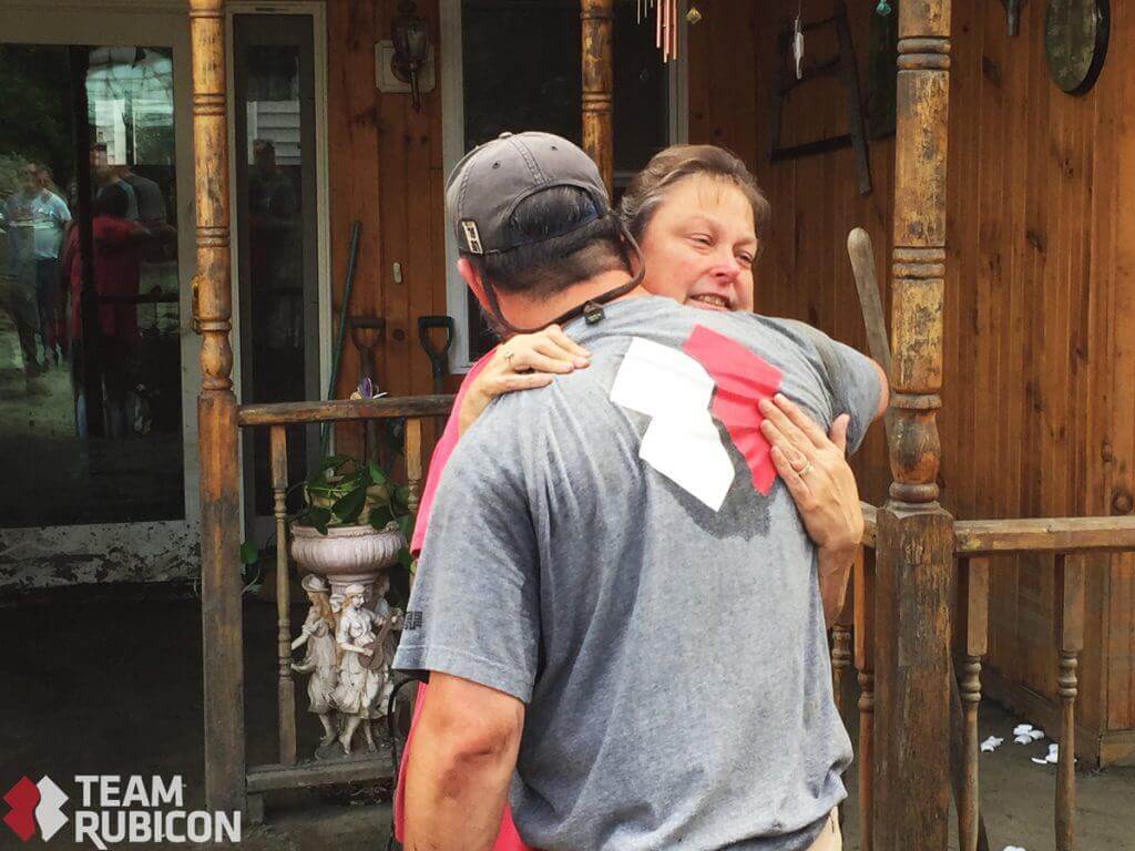 Volunteer Brian Harlow receives a thank you from Bonnie. 