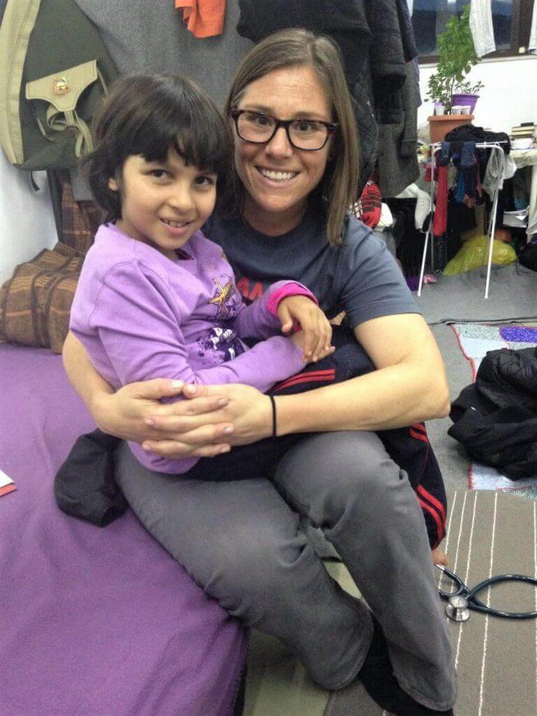 Lena alongside physician assistant Cara Bosco.