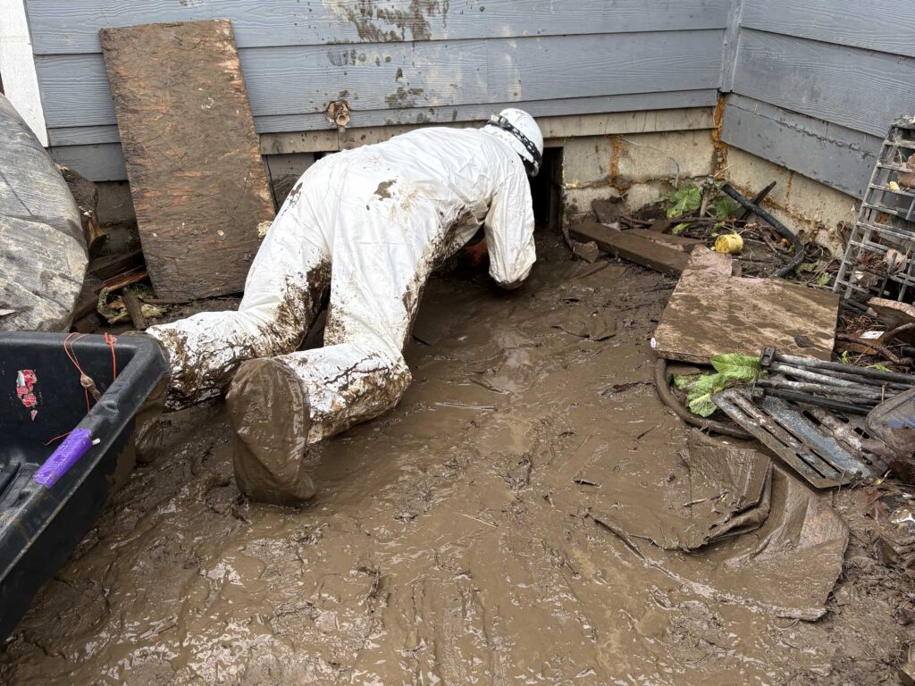 Christmas volunteering work at a flooded home