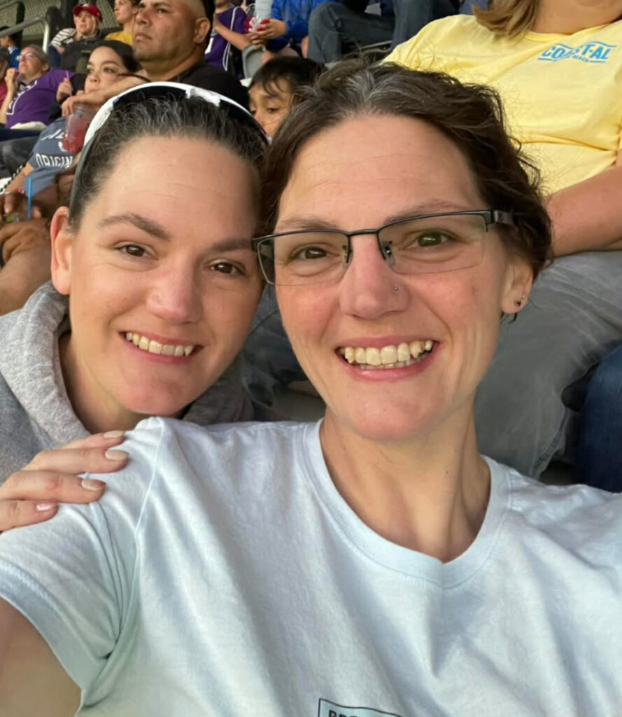 twin sisters volunteering together